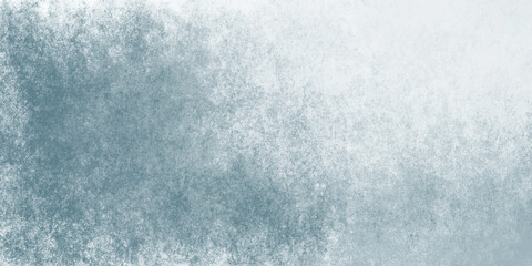Subtle grunge brush pattern in light blue background

