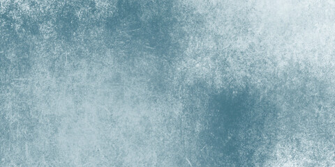 Blue abstract wall texture with faded grunge brushwork

