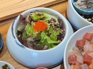 Sashimi Rice Bowl topped with Egg Yolk and Natto with peanuts tofu and Black Squid Ink Soup