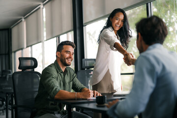 Naklejka na ściany i meble Diverse multiethnic business people, handshake for agreement, b2b deal and cooperation for project