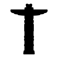 Black silhouette of a north American Totem pole against white backdrop