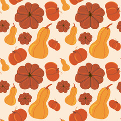 Seamless vector pattern of autumn pumpkins, squashes  and gourds in fall colors. Bright flat design for autumnal, harvest, and Thanksgiving backgrounds and prints.