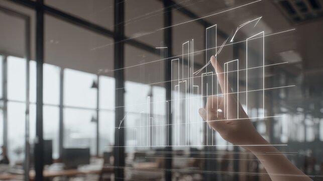 Hand interacting with transparent white-outlined holographic bar chart showing upward-trending line graph in modern office with natural light, minimalist design, dark glass partitions