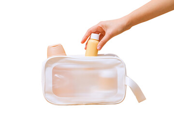 Placing beauty bottles in a bag, isolated on white, PNG
