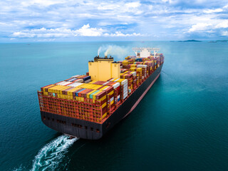 logistic cargo container ship sailing in sea to import export goods and distributing products to...