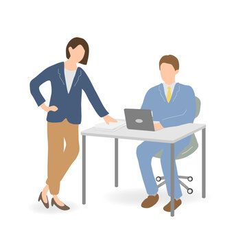 Female Supervisor Giving On-the-Job Training to Young Male Employee