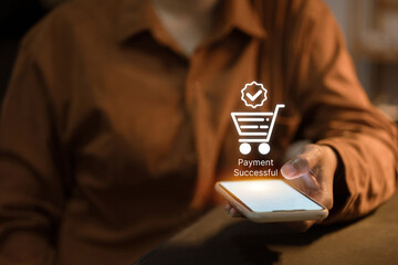A Payment Successful icon with a shopping cart floats above a smartphone, confirming a completed online purchase.