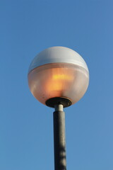 street lamp on blue sky background