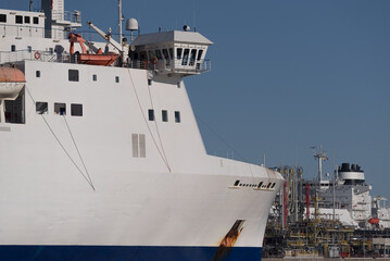
MARITIME TRANSPORT - Passenger and car ferry sail to the seaport 

