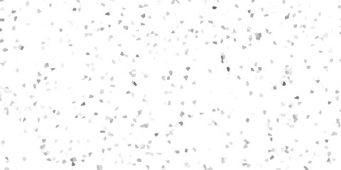 Abstract geometric patterned background featuring a textured effect with small shapes in varying shades of gray on a white backdrop for design