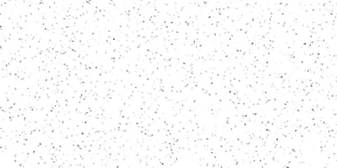 Abstract textured background with a mosaic appearance consisting of numerous irregularly shaped small elements in shades of gray on white