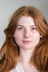 Portrait of a beautiful young red-haired woman