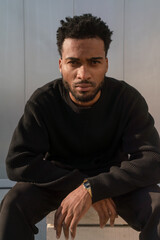 Portrait of a handsome young man on a minimalistic background