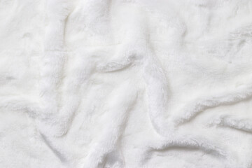White Faux Fur Texture, Soft, white artificial fur with fluffy texture and gentle shadows. Close-up textile background delicate textures, top view, copyspace, backdrop with soft folds