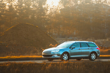 Modern sports wagon in natural landscape