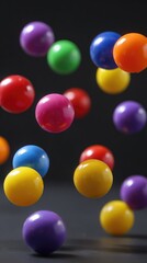 Colorful bouncing balls in mid-aidemonstrating gravity andmotion dynamics, physicsconcept of elasticity and kineticenergyin action.
