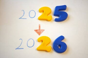 2025-2026 subtitle or text with white background.