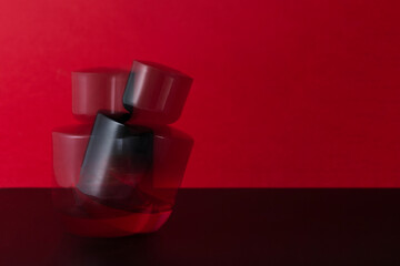 Bold red perfume bottle with motion blur, conveying luxury, sensuality, and movement. A visually striking concept in fragrance, glamour, and high-end beauty branding.