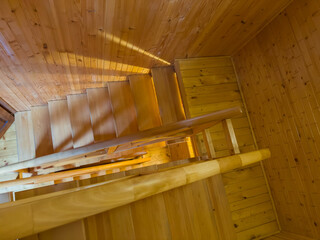 Internal wooden stairs of building, top view of stair case