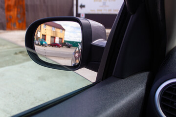 car interior, rear view mirror, car window, view from the rear view window in the car