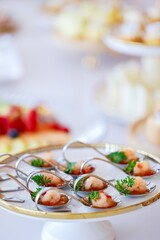 Assorted delicious desserts and cakes exquisitely arranged on table, close-up, festive celebration, buffet