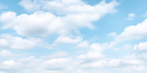 Obraz premium Bright blue sky with fluffy white clouds du daytime in clear weather