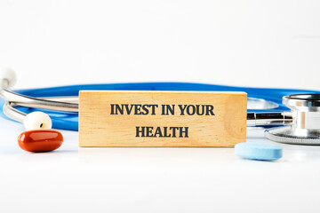 THE CONCEPT PHRASE INVEST IN YOUR HEALTH. Concept health, sport, diet and fitness