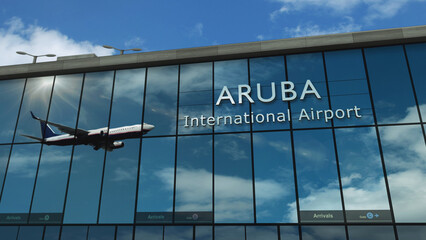Plane landing in Aruba Caribbean airport with signboard