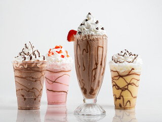 Four tempting milkshake variations: chocolate, strawberry, vanilla, and a mocha blend