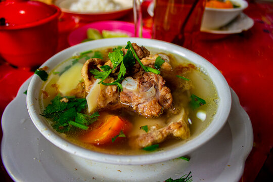 sop buntut or oxtail soup or tail soup is traditional soup made from tail ox, Boiled with Spices