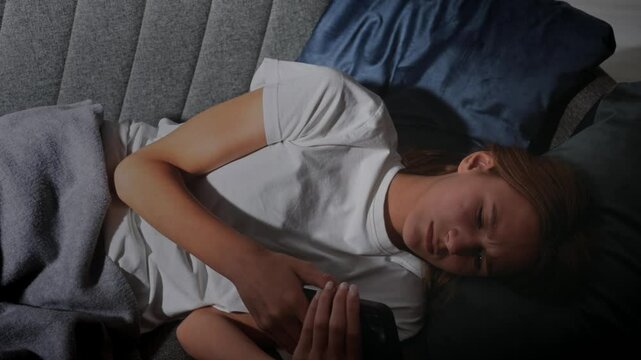 Comfortable Resting Woman Sleeping Peacefully on a Cozy Sofa