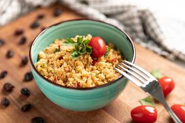 Moroccan couscous salad with cherry tomatoes and raisins