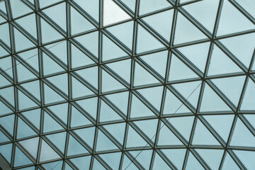 Architectural glass structure with a geometric triangular pattern, Steel glass roof wall construction transparent window with support system