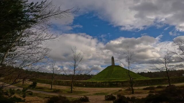 One of the highest points of the Utrecht Hill Ridge, Woudenberg. View of the Pyramide van Austerlitz in Zeist, Netherlands on a cloudy day of spring