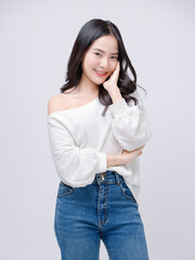 Half body portrait happy smile young asian beautiful woman curly hair wearing long sleeve shirt, blue jeans outfit, casual standing pose on white background joy positivity fashion lifestyle concept.