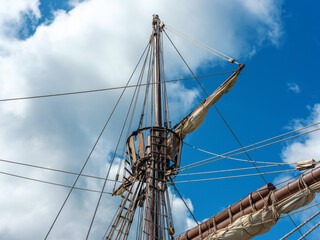 Crows Nest and Rigging of a Traditional Sailing Ship Against Blue Sky