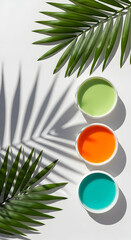 Fresh Herbal Green Juice and Vibrant Fruit Infusions with Tropical Palm Leaves