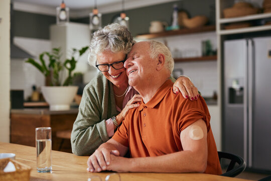 Loving senior couple embracing after measuring blood sugar level