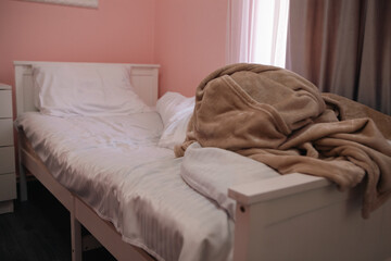bed and pillows at bedroom.