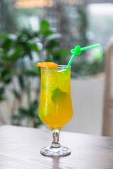 Lemonades with ice and a slice of lemon on top
