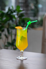 Lemonades with ice and a slice of lemon on top
