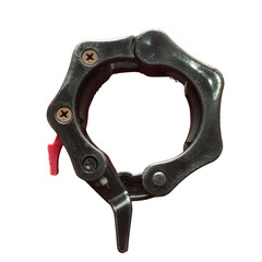 A black metal clamp with a red lever and screws, designed to secure cylindrical objects tightly.