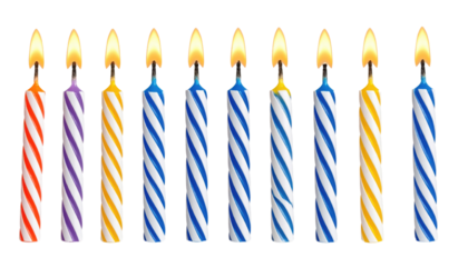 Eleven lit birthday candles with striped patterns in red, purple, yellow, and blue colors arranged in a row.
