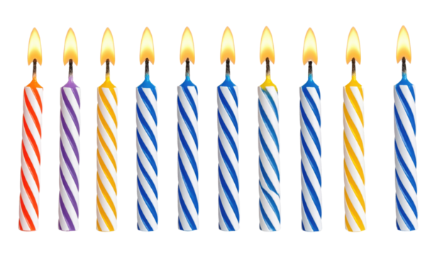 Eleven lit birthday candles with striped patterns in red, purple, yellow, and blue colors arranged in a row.