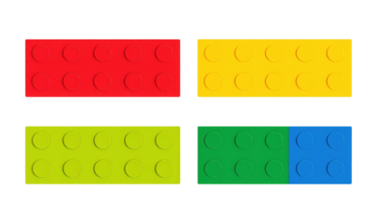 Four colorful plastic toy bricks in red, yellow, green, and blue, each with circular studs on top for building and connecting.