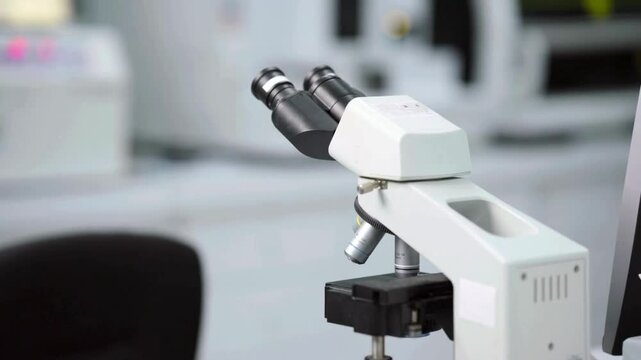 A scientist studies microbial life under a microscope, investigating the role of bacteria in food spoilage and how to prevent contamination.