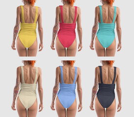 Mockup of a bright one-piece monokini on a red-haired girl with a tattoo, back view, for design,...