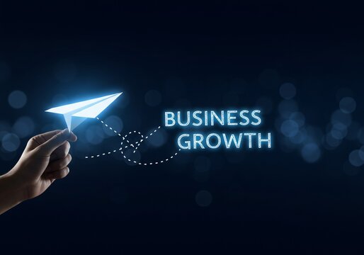 A hand is launching a paper airplane towards the words 'BUSINESS GROWTH', representing the initiation of strategies or plans to achieve business expansion.