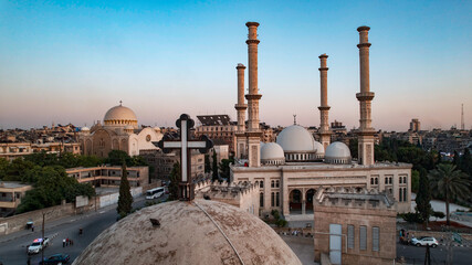 A church next to a mosque, peaceful coexistence in Syria. Suicide bombing at the Greek Orthodox Church of the Prophet Elias in Damascus.