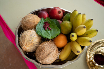Traditional Tropical Fruit Offering with Coconuts and Betel Leaves